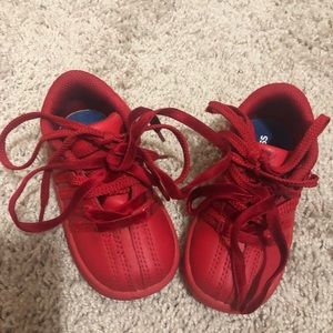 Red leather K Swiss, with 2 shoe strings.